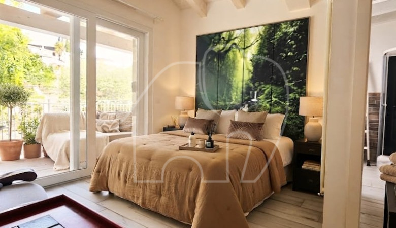 Appartamento su due livelli con vista lago e dependance
