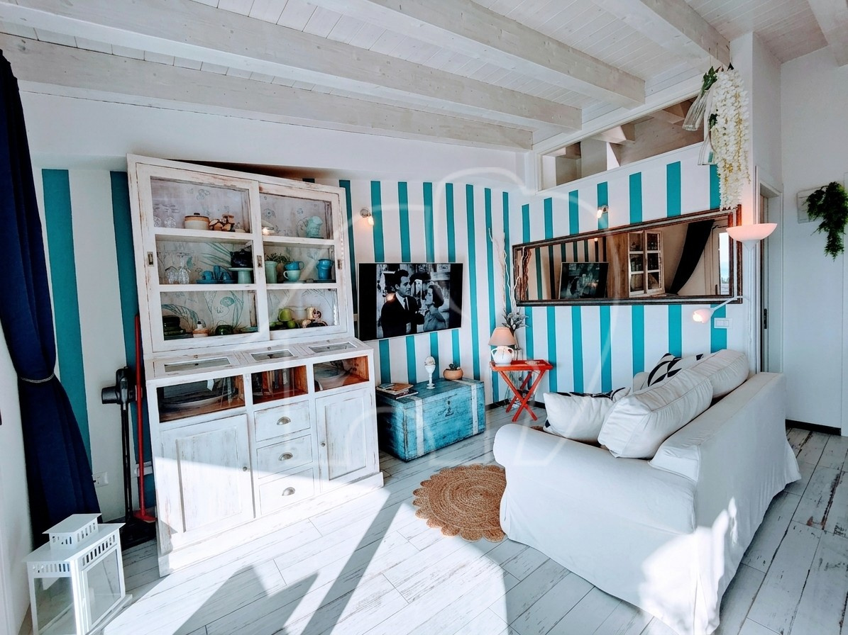005__n3 Elegante bilocale con vista lago e piscina