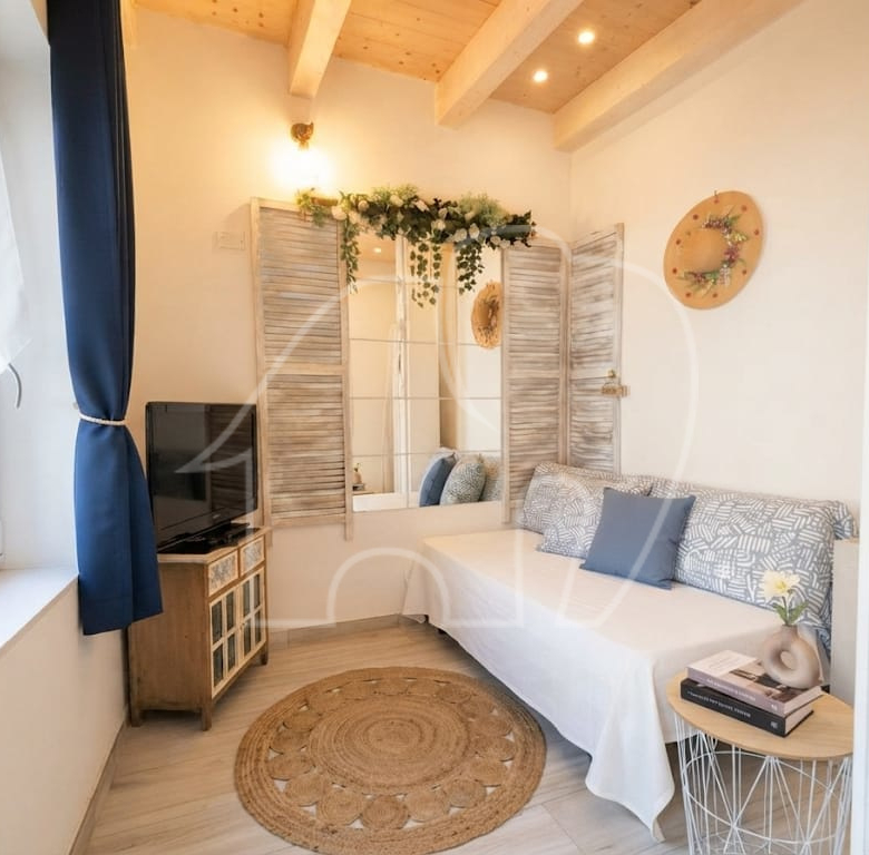 Appartamento su due livelli con vista lago e dependance