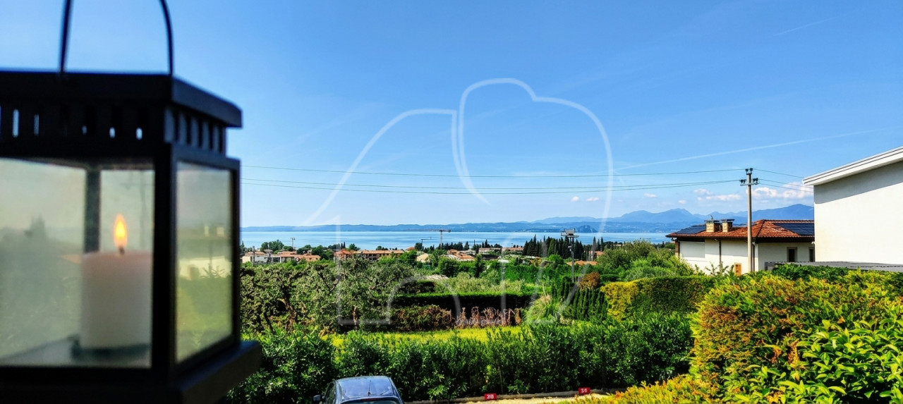 021__n3 Appartamento su due livelli con vista lago e dependance