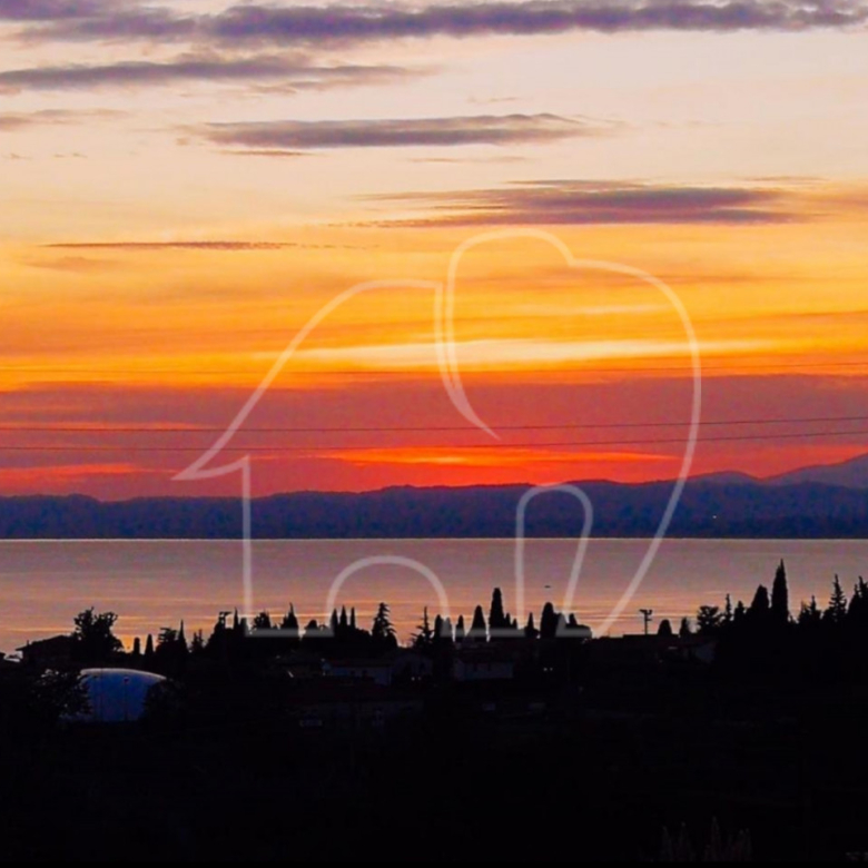 Appartamento su due livelli con vista lago e dependance