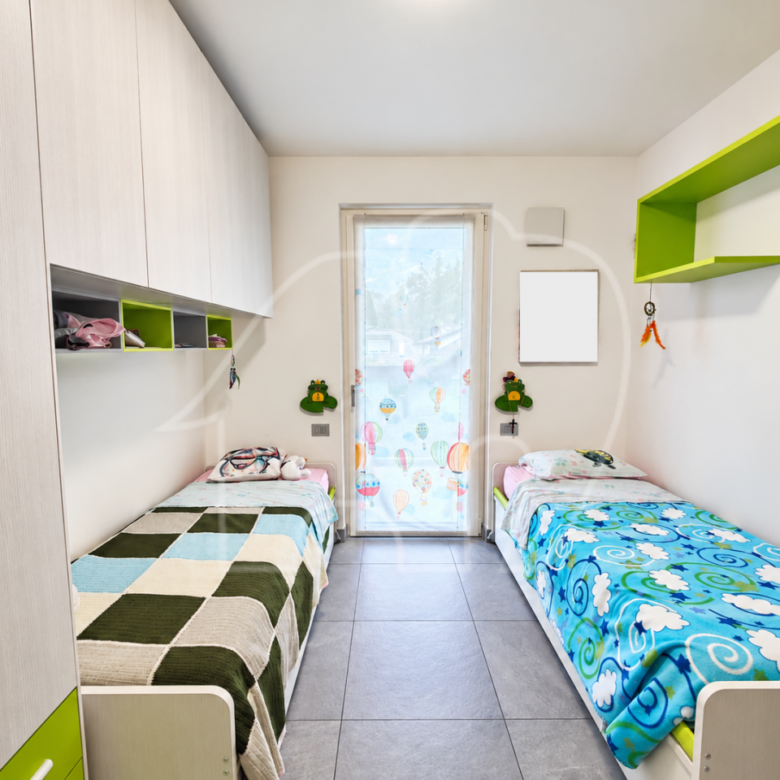 Quadrilocale con ampie terrazze e garage doppio