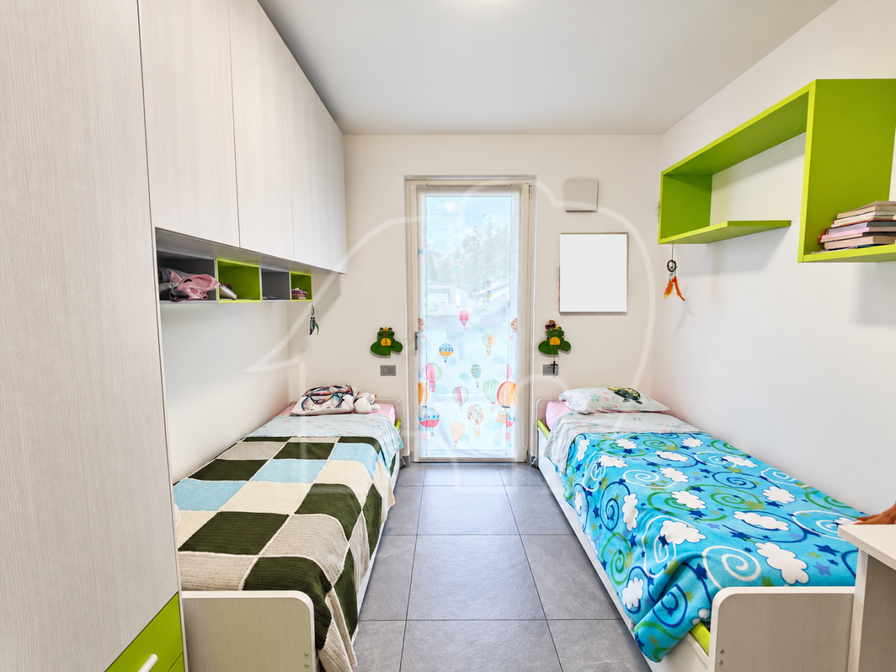 Quadrilocale con ampie terrazze e garage doppio